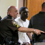 deputies escort inmate