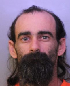 Police: Man killed sleeping couple, buried bodies in swamp