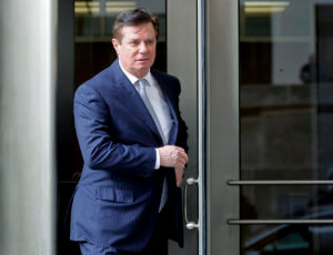 Trump aide Manafort removed from plane for revoked passport