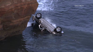 Police rescue family after dad drove with toddlers off cliff