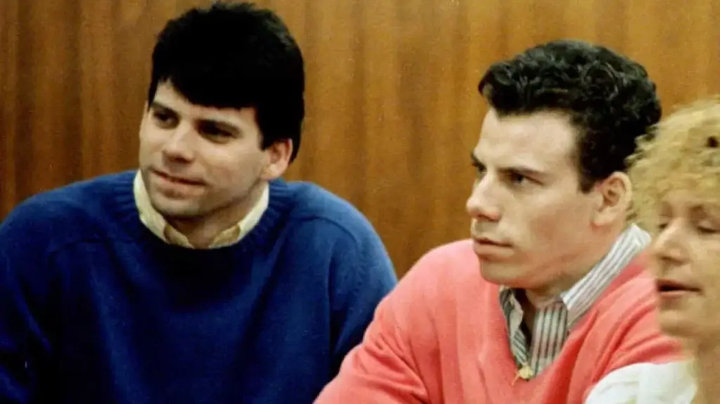 Lyle Menendez, right, and his brother, Erik, sit in the courtroom