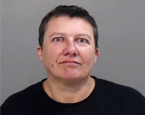 Court papers: Woman wrote ‘give up’ in ricin note to Trump