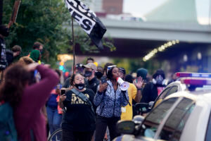 Louisville drops curfew; legislator questions rioting law
