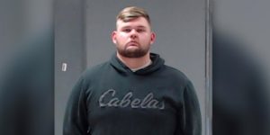 Texas officer charged with murder in fatal store shooting