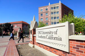 Couple gets prison time for paying bribes in college scam
