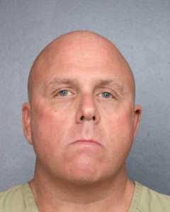 Ex-Giant Baker cleared of robbery; victims’ lawyer arrested