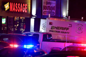 Georgia massage parlor shootings leave 8 dead; man captured