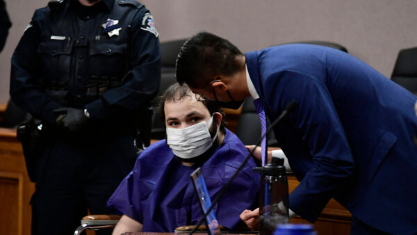 Colorado shooting suspect makes his 1st court appearance