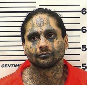 Report: guards didn’t notice after killer beheaded cellmate