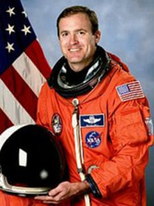 Former astronaut pleads guilty in traffic deaths of 2 girls