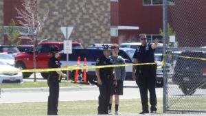 Sheriff: Girl shoots 3 at Idaho school; teacher disarms her