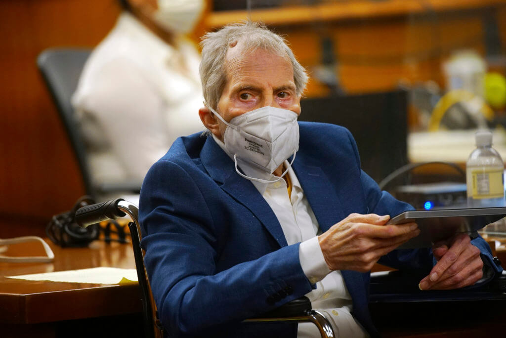 Robert Durst sits wearing a face mask in court
