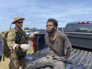 Police capture man wanted in 4 killings after week on run