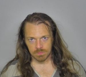 Charges: Man used modified yo-yo string to try to kill woman
