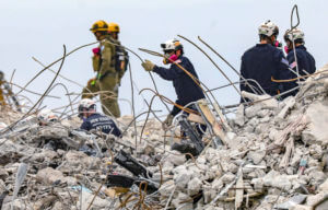 Tears, prayer mark end to search for Florida condo survivors