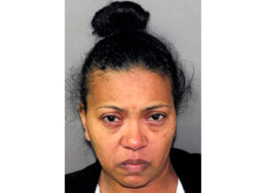 Warden at NYC federal jail charged with killing husband