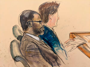 R. Kelly accuser testifies that he sexually abused her at 17