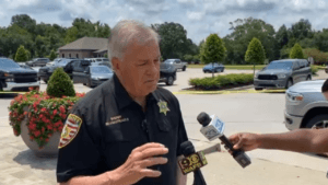Suspect accused of stabbing grandmother and mother, shooting three others in custody