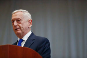 Former US defense secretary testifies in Holmes fraud trial