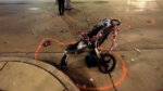 broken stroller on the street