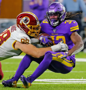 Accused of assaulting ex, Vikes’ Cook says she assaulted him