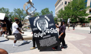 Denver suburb to pay $15M to settle Elijah McClain lawsuit