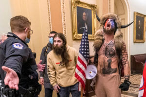 Capitol rioter who hit officer gets over 3 years in prison