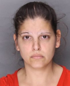 Woman convicted in death of boy, 12; dad serving life term