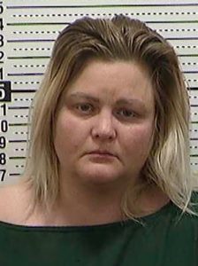 Woman charged in 2007 death of 18-year-old roommate