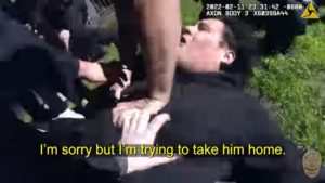 Man tackled by LAPD after chase was holding baby in arms