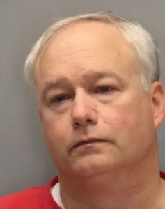 Prep school official charged with dealing child pornography