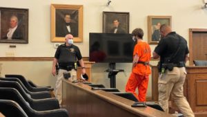 Man accused of killing ex-lawmaker’s daughters pleads not guilty