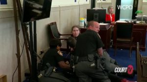 Ohio man attacks son’s accused murderer in court