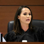 Judge Elizabeth Scherer speaks from the bench