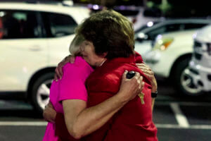 Man, 71, held in Alabama church shooting that killed 2