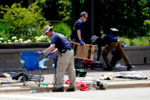 Police: Parade shooting suspect contemplated 2nd shooting