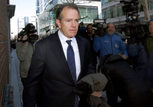 Ex-Georgetown coach gets 2 1/2 years in bribery scandal