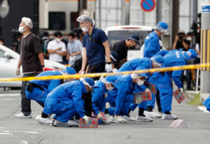 Police probe of Abe security lapse begins as Japan mourns