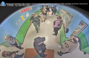 Uvalde’s new anguish: Video shows police waiting in school