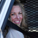 Lori Vallow Daybell sits in a police car
