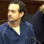A man sits in court
