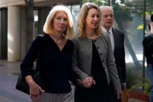 Elizabeth Holmes seeks new trial, cites key witness’ regrets
