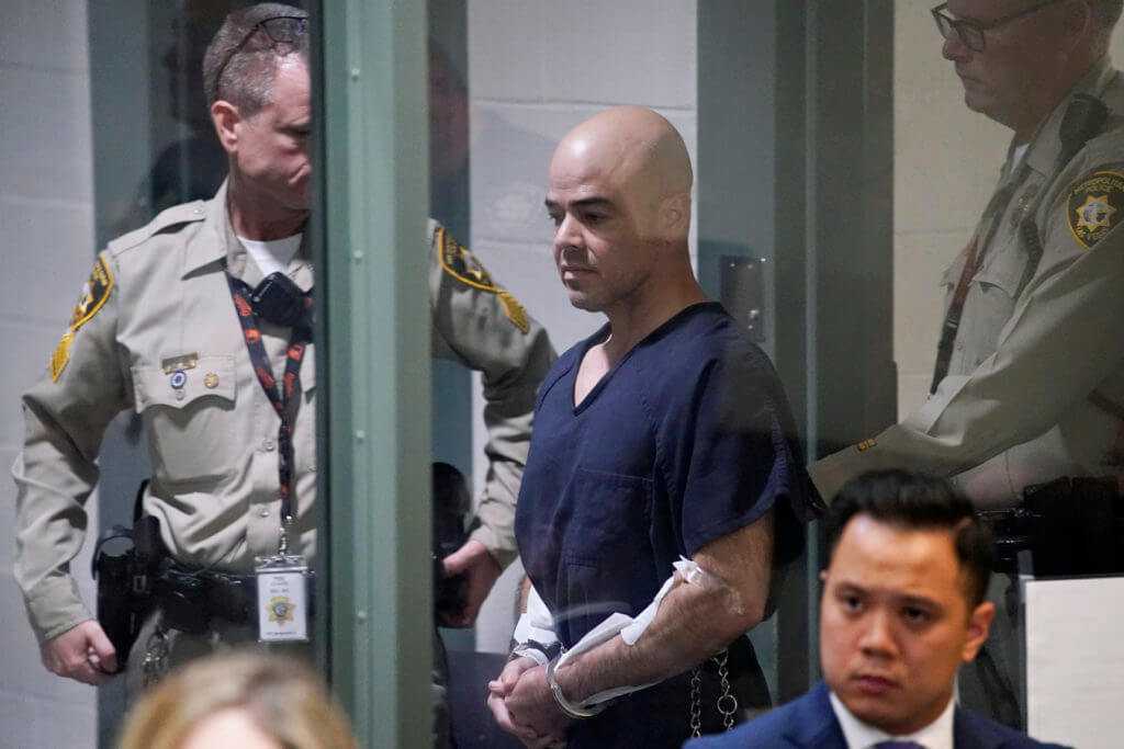 Robert "Rob" Telles is escorted into court