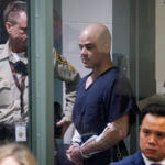 Robert "Rob" Telles is escorted into court