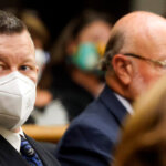 Photo of Paul Flores, in a mask.