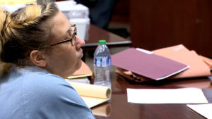 Judge orders new trial for woman convicted of killing newborn twins