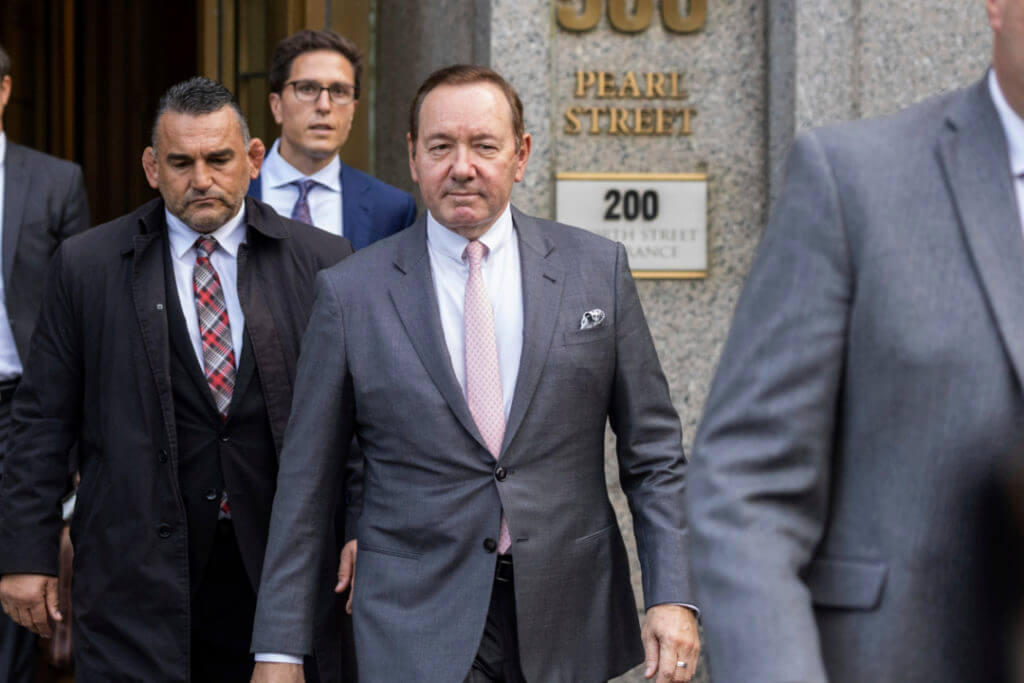 Actor Kevin Spacey, center, leaves court, Monday, Oct. 17, 2022