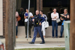 Man charged with murder in Detroit-area hotel shooting