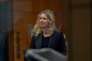 Elizabeth Holmes fights against demands she pay victims $250 a month