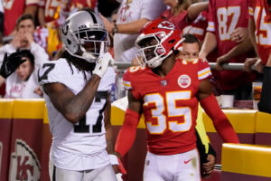 Raiders’ Davante Adams charged for shoving photographer